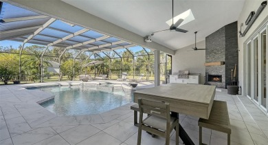 Welcome to this exceptional five-bedroom, five-and-a-half-bath on Laurel Oak Country Club in Florida - for sale on GolfHomes.com, golf home, golf lot