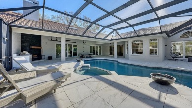 Welcome to this exceptional five-bedroom, five-and-a-half-bath on Laurel Oak Country Club in Florida - for sale on GolfHomes.com, golf home, golf lot