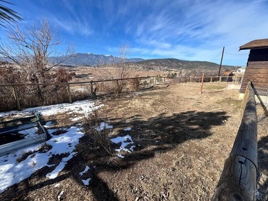 Excellent location and awesome views of the Greenhorn mountain on Hollydot Golf Course in Colorado - for sale on GolfHomes.com, golf home, golf lot