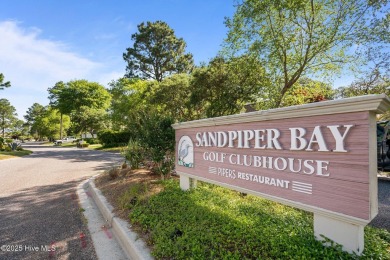 Dream of owning a waterfront condo at the beach, look no on Sandpiper Bay Golf and Country Club in North Carolina - for sale on GolfHomes.com, golf home, golf lot