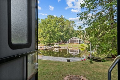 WATERFRONT PACKAGE DEAL AT LAKE ROYALE!!! on River Golf and County Club at Lake Royale in North Carolina - for sale on GolfHomes.com, golf home, golf lot