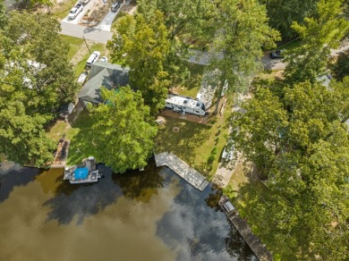 WATERFRONT PACKAGE DEAL AT LAKE ROYALE!!! on River Golf and County Club at Lake Royale in North Carolina - for sale on GolfHomes.com, golf home, golf lot