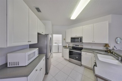 Open, airy and inviting, this 2 bedroom/2 bath/2 car garage home on Scepter Golf Club in Florida - for sale on GolfHomes.com, golf home, golf lot