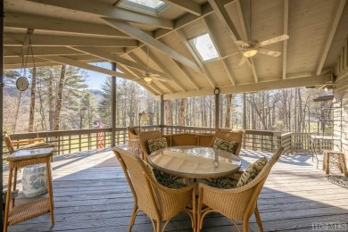 Perched majestically above the eighth fairway and green of the on The Country Club of Sapphire Valley in North Carolina - for sale on GolfHomes.com, golf home, golf lot