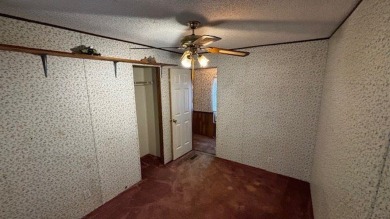 Discover affordable lake-area living in Pendleton Harbor, a on Pendleton Harbor in Texas - for sale on GolfHomes.com, golf home, golf lot