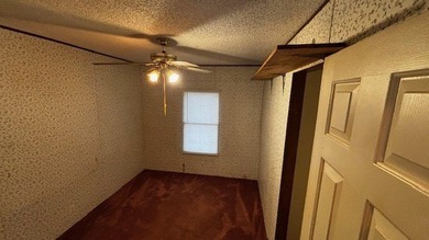 Discover affordable lake-area living in Pendleton Harbor, a on Pendleton Harbor in Texas - for sale on GolfHomes.com, golf home, golf lot