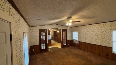 Discover affordable lake-area living in Pendleton Harbor, a on Pendleton Harbor in Texas - for sale on GolfHomes.com, golf home, golf lot