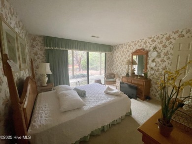 Lake front on Lake Pinehurst! 1050 Burning Tree, tucked back in on Pinehurst Resort and Country Club in North Carolina - for sale on GolfHomes.com, golf home, golf lot