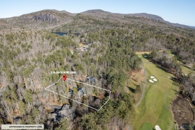 Perched majestically above the eighth fairway and green of the on The Country Club of Sapphire Valley in North Carolina - for sale on GolfHomes.com, golf home, golf lot