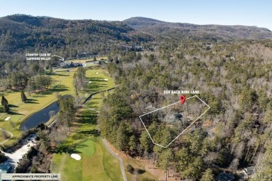 Perched majestically above the eighth fairway and green of the on The Country Club of Sapphire Valley in North Carolina - for sale on GolfHomes.com, golf home, golf lot