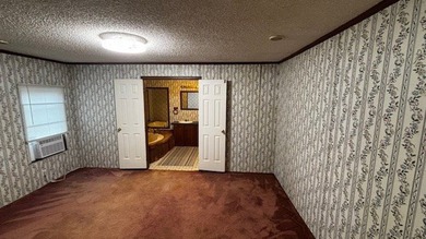 Discover affordable lake-area living in Pendleton Harbor, a on Pendleton Harbor in Texas - for sale on GolfHomes.com, golf home, golf lot