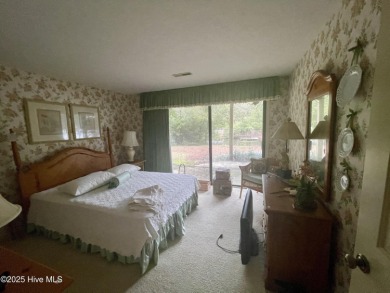 Lake front on Lake Pinehurst! 1050 Burning Tree, tucked back in on Pinehurst Resort and Country Club in North Carolina - for sale on GolfHomes.com, golf home, golf lot