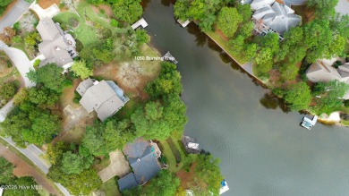 Lake front on Lake Pinehurst! 1050 Burning Tree, tucked back in on Pinehurst Resort and Country Club in North Carolina - for sale on GolfHomes.com, golf home, golf lot