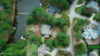 Lake front on Lake Pinehurst! 1050 Burning Tree, tucked back in on Pinehurst Resort and Country Club in North Carolina - for sale on GolfHomes.com, golf home, golf lot