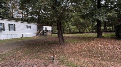 Discover affordable lake-area living in Pendleton Harbor, a on Pendleton Harbor in Texas - for sale on GolfHomes.com, golf home, golf lot