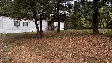 Discover affordable lake-area living in Pendleton Harbor, a on Pendleton Harbor in Texas - for sale on GolfHomes.com, golf home, golf lot