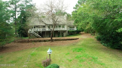 Lake front on Lake Pinehurst! 1050 Burning Tree, tucked back in on Pinehurst Resort and Country Club in North Carolina - for sale on GolfHomes.com, golf home, golf lot