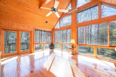 Perched majestically above the eighth fairway and green of the on The Country Club of Sapphire Valley in North Carolina - for sale on GolfHomes.com, golf home, golf lot