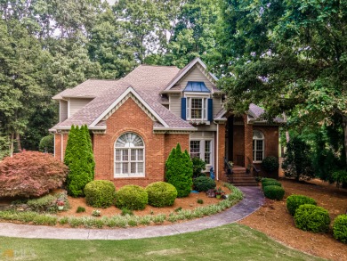 Stunning 4-sided brick 4 bedroom / 4.5 bathroom home nestled in on Royal Lakes Golf and Country Club in Georgia - for sale on GolfHomes.com, golf home, golf lot