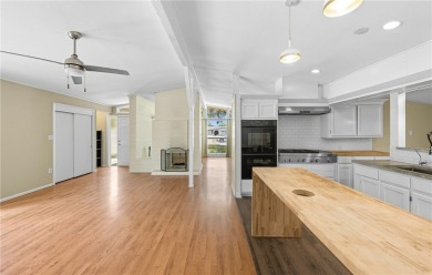 Incredible vintage style, contemporary 4 bedroom, 2 bath BAY on Oso Beach Municipal Golf Course in Texas - for sale on GolfHomes.com, golf home, golf lot