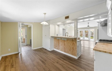 Incredible vintage style, contemporary 4 bedroom, 2 bath BAY on Oso Beach Municipal Golf Course in Texas - for sale on GolfHomes.com, golf home, golf lot