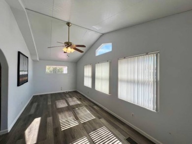 This beautiful move in ready 1992 Redman home with 3 bedrooms, 2 on Voyager RV Resort and Golf Course in Arizona - for sale on GolfHomes.com, golf home, golf lot