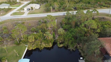 This exceptional WATERFRONT lot in South Gulf Cove offers direct on Rotonda Golf and Country Club - Long Marsh  in Florida - for sale on GolfHomes.com, golf home, golf lot