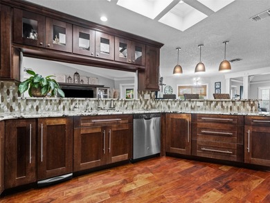 Experience luxury living in this beautifully upgraded 3-bedroom on The Links of Lake Bernadette in Florida - for sale on GolfHomes.com, golf home, golf lot