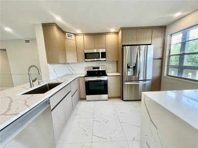 GREAT OPPORTUNITY GREAT PRICE ALL NEW ALL RENOVATED JUST FOR on Wynmoor Golf Course in Florida - for sale on GolfHomes.com, golf home, golf lot