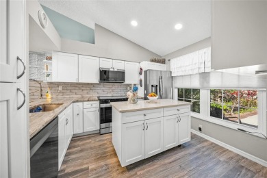 What a *WOW* when you walk into this beautifully updated villa on University Park Country Club in Florida - for sale on GolfHomes.com, golf home, golf lot