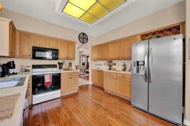 This isn't merely a house; it's your front-row view of the lush on Kissimmee Golf Club in Florida - for sale on GolfHomes.com, golf home, golf lot
