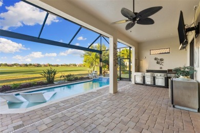 Welcome to this exquisite abode nestled within Esplanade Golf on Esplanade Golf and Country at Lakewood Ranch in Florida - for sale on GolfHomes.com, golf home, golf lot
