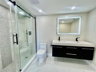 GREAT OPPORTUNITY GREAT PRICE ALL NEW ALL RENOVATED JUST FOR on Wynmoor Golf Course in Florida - for sale on GolfHomes.com, golf home, golf lot