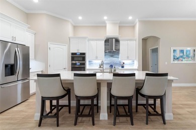 One or more photo(s) has been virtually staged. One or more on The Grand Club Cypress Course in Florida - for sale on GolfHomes.com, golf home, golf lot