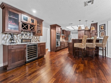 Experience luxury living in this beautifully upgraded 3-bedroom on The Links of Lake Bernadette in Florida - for sale on GolfHomes.com, golf home, golf lot