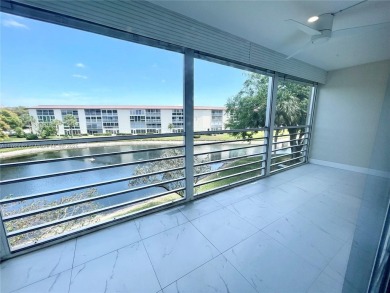 GREAT OPPORTUNITY GREAT PRICE ALL NEW ALL RENOVATED JUST FOR on Wynmoor Golf Course in Florida - for sale on GolfHomes.com, golf home, golf lot
