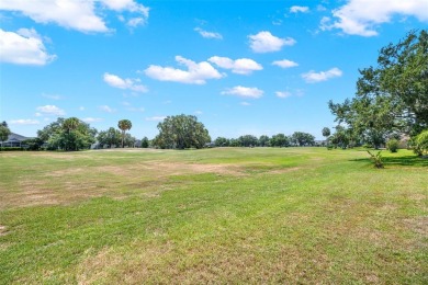 This isn't merely a house; it's your front-row view of the lush on Kissimmee Golf Club in Florida - for sale on GolfHomes.com, golf home, golf lot