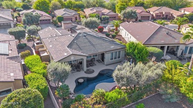 This 3 bedroom home with a heated pool has been very well on Trilogy Golf Club At Vistancia in Arizona - for sale on GolfHomes.com, golf home, golf lot