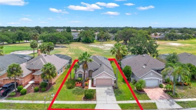 This isn't merely a house; it's your front-row view of the lush on Kissimmee Golf Club in Florida - for sale on GolfHomes.com, golf home, golf lot