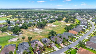 This isn't merely a house; it's your front-row view of the lush on Kissimmee Golf Club in Florida - for sale on GolfHomes.com, golf home, golf lot