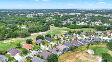 This isn't merely a house; it's your front-row view of the lush on Kissimmee Golf Club in Florida - for sale on GolfHomes.com, golf home, golf lot