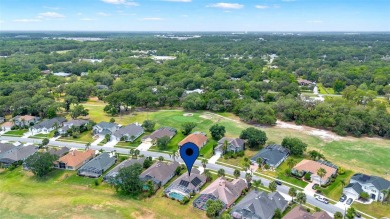 This isn't merely a house; it's your front-row view of the lush on Kissimmee Golf Club in Florida - for sale on GolfHomes.com, golf home, golf lot