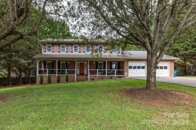 Welcome to this beautiful 5-bedroom, 2.5-bath home nestled in a on Catawba Springs Golf Course At Lake Hickory  in North Carolina - for sale on GolfHomes.com, golf home, golf lot