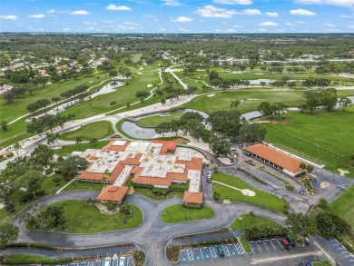 What a *WOW* when you walk into this beautifully updated villa on University Park Country Club in Florida - for sale on GolfHomes.com, golf home, golf lot