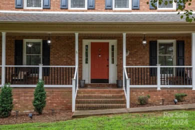 Welcome to this beautiful 5-bedroom, 2.5-bath home nestled in a on Catawba Springs Golf Course At Lake Hickory  in North Carolina - for sale on GolfHomes.com, golf home, golf lot