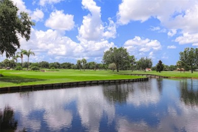 What a *WOW* when you walk into this beautifully updated villa on University Park Country Club in Florida - for sale on GolfHomes.com, golf home, golf lot
