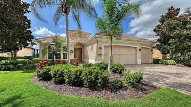 Positioned on a premier south-facing homesite with serene lake on Ritz-Carlton Members Golf Club in Florida - for sale on GolfHomes.com, golf home, golf lot