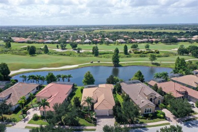Positioned on a premier south-facing homesite with serene lake on Ritz-Carlton Members Golf Club in Florida - for sale on GolfHomes.com, golf home, golf lot