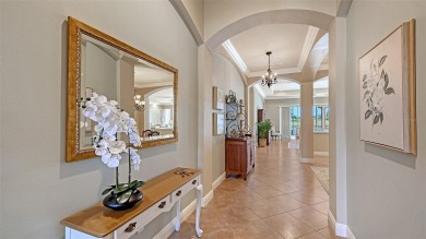 Positioned on a premier south-facing homesite with serene lake on Ritz-Carlton Members Golf Club in Florida - for sale on GolfHomes.com, golf home, golf lot
