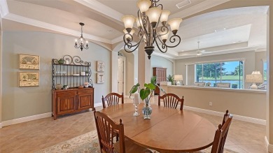 Positioned on a premier south-facing homesite with serene lake on Ritz-Carlton Members Golf Club in Florida - for sale on GolfHomes.com, golf home, golf lot